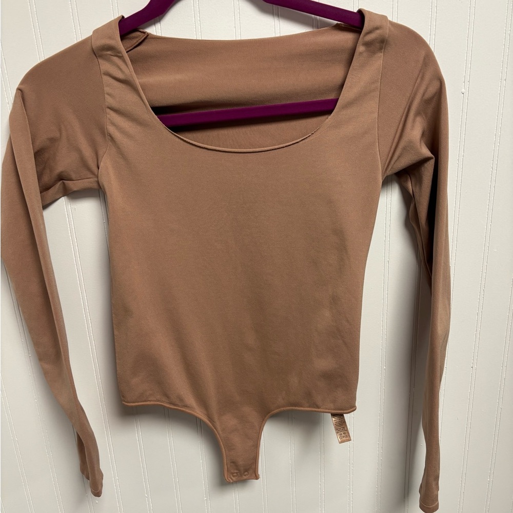 SKIMS  Tan Long Sleeve Thong Bodysuit